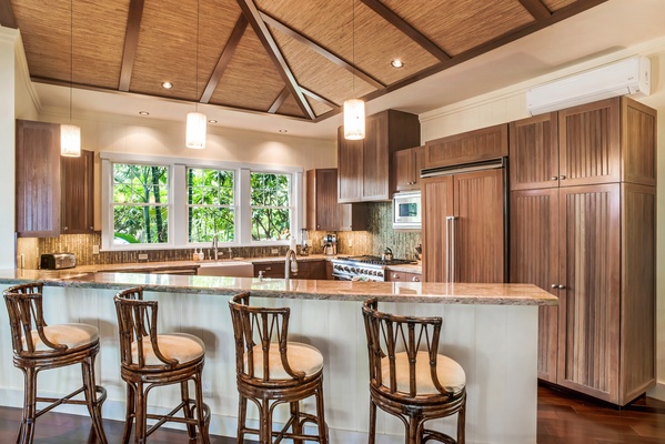 Beautiful Granite Countertops & Bar with Seating for Six.