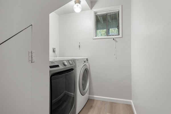 Spice up your laundry routine with a fiery ambiance in the laundry room.