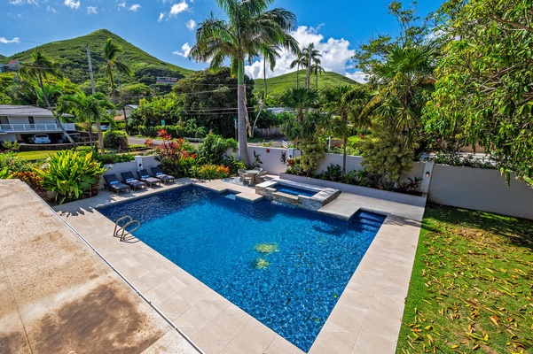 Birds eye view of the pool from the media room lanai. (Note: Upper pool area is a part of the pool and NOT a spa)