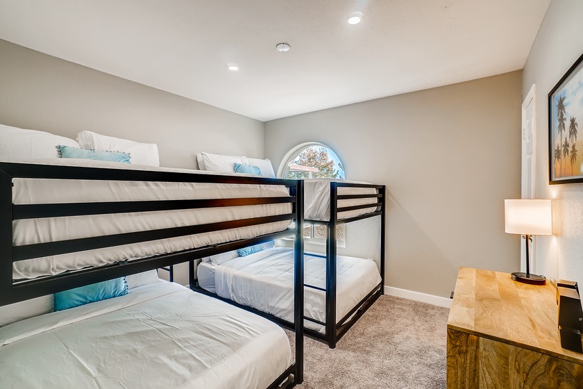 Bedroom 5 offers two queen over queen bunk beds