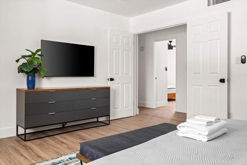 See the master bedroom TV and dresser!