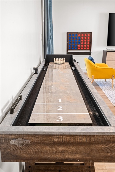 Play some fun Shuffleboard in our awesome game room!