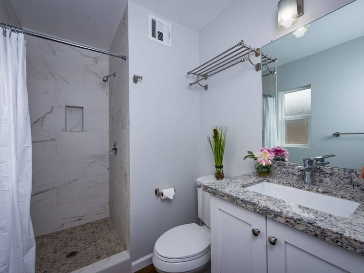 Bathroom two is stocked and ready for you with a walk in shower and all the bathroom necessities