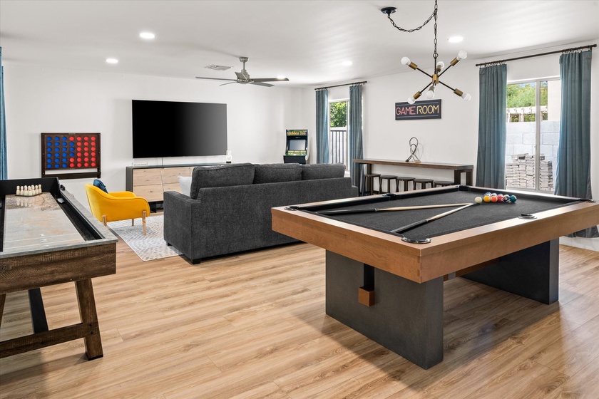 Play pool & watch the big game with friends in our game room!