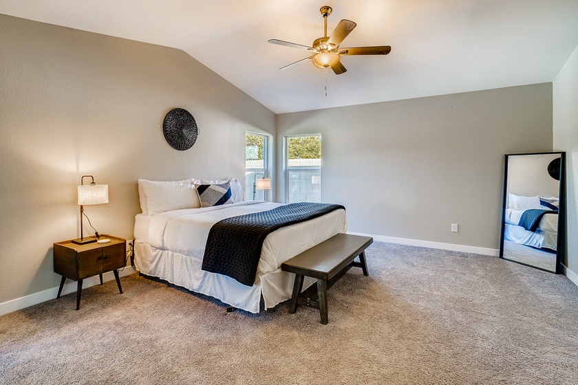 The master bedroom offers a king bed...