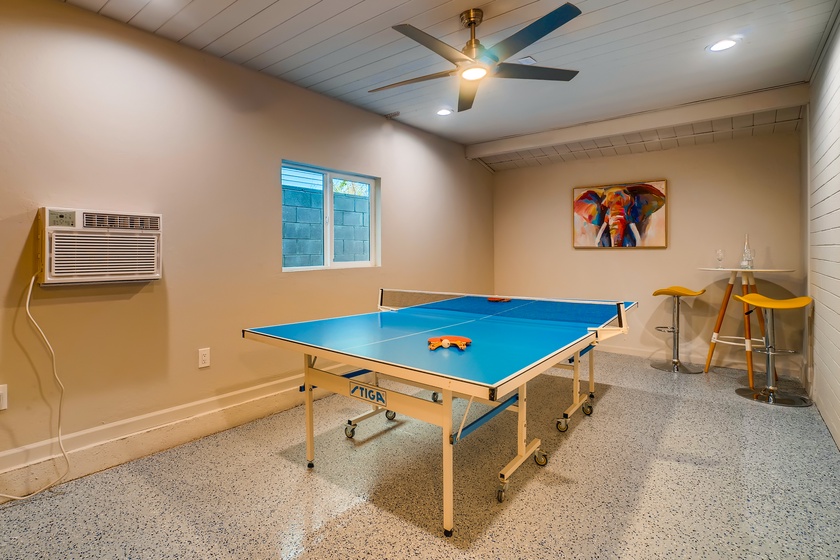 The converted garage is all set and ready for you to enjoy the Ping Pong table