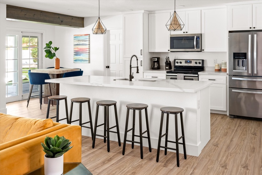 Eat and converse with friends over our incredible kitchen island!