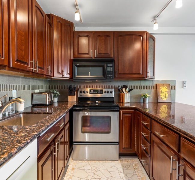 The kitchen is equipped with all the basic appliances