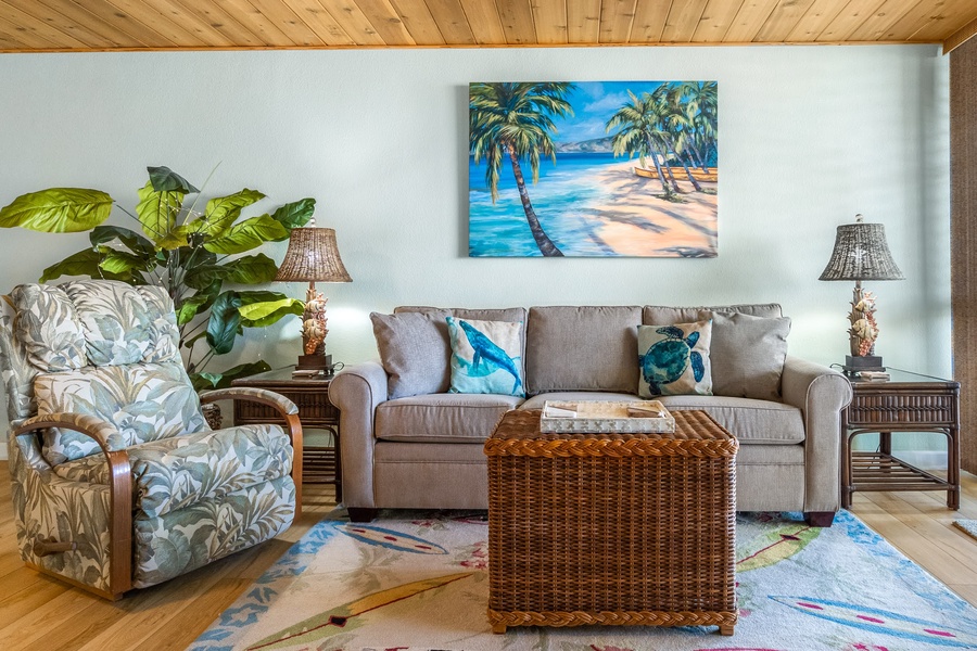 Living room features a comfortable sofa sleeper