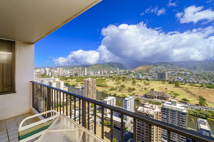 Capture the energy of Oahu’s bustling streets from your own private balcony, a front-row seat to the city’s charm.