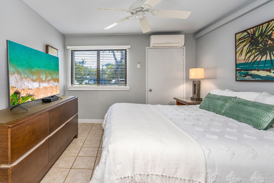 Bedroom features a comfortable California King bed