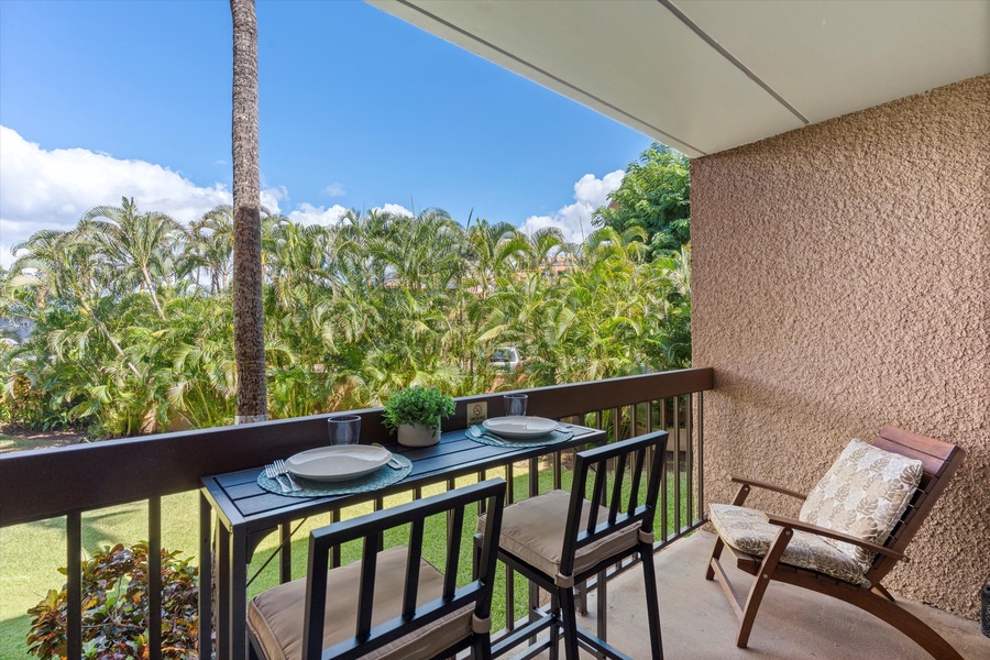 Bar Height Seating on Lanai Along with Relaxing Side Chair