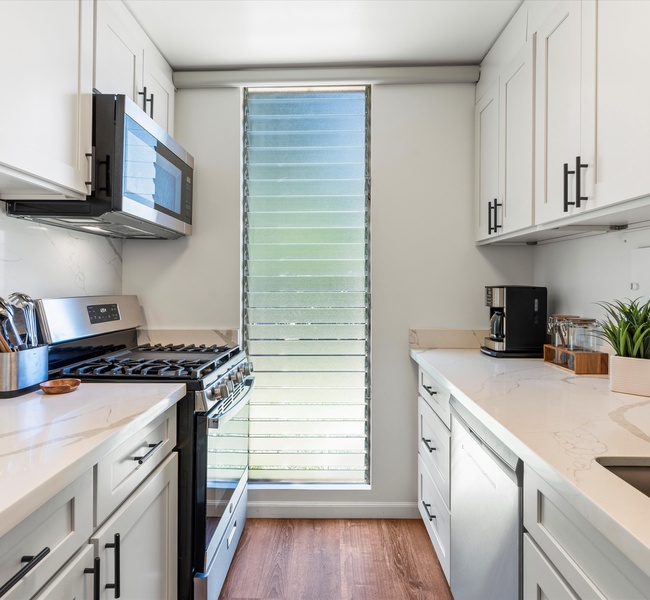 This kitchen is equipped with basic appliances