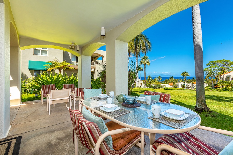 Outdoor lanai with ample seating and ocean views