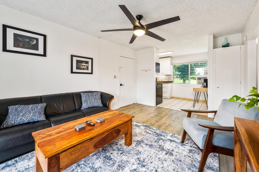 Living room next to kitchen area