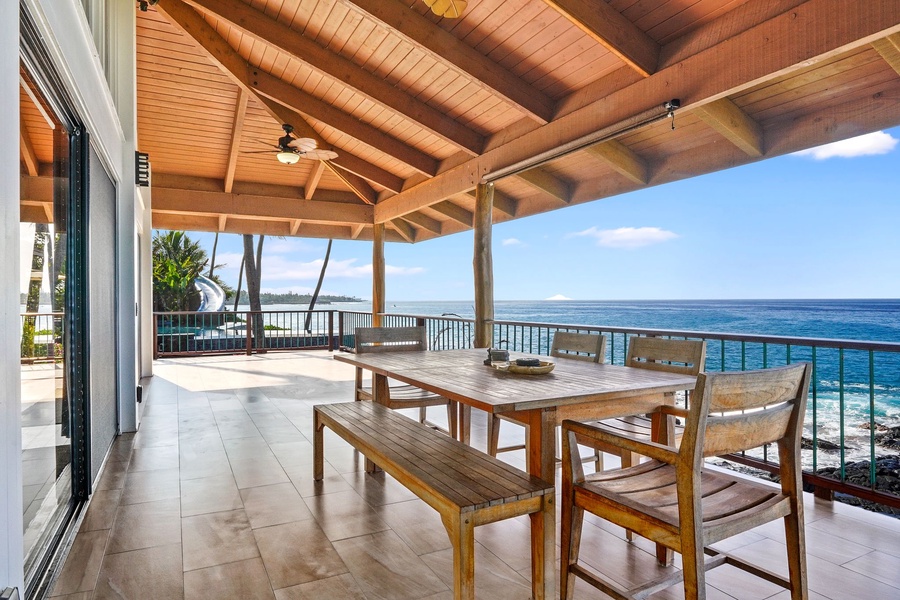 Dine outside on lanai off of main house 