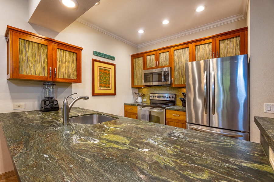 Well equipped kitchen and ample counter space for meal prep