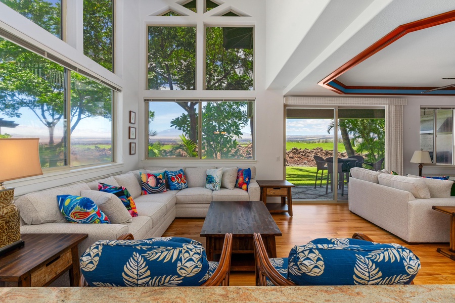 Floor to ceiling windows offering panoramic views of the golf course