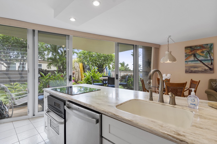 Open the lanai sliding doors for a tropical breeze and natural l