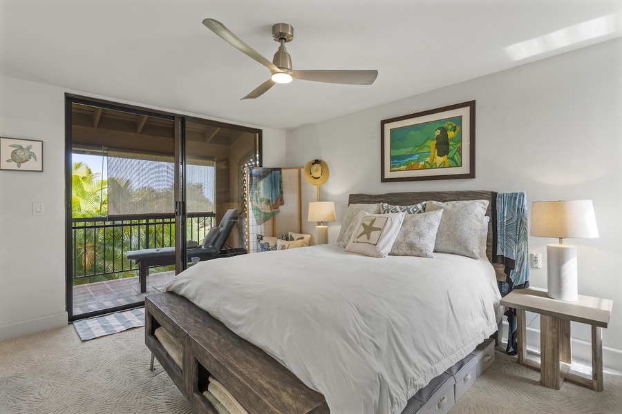 Primary bedroom features a king bed