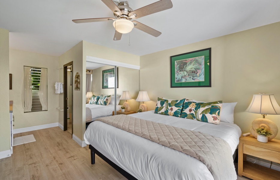Primary bedroom features a king bed
