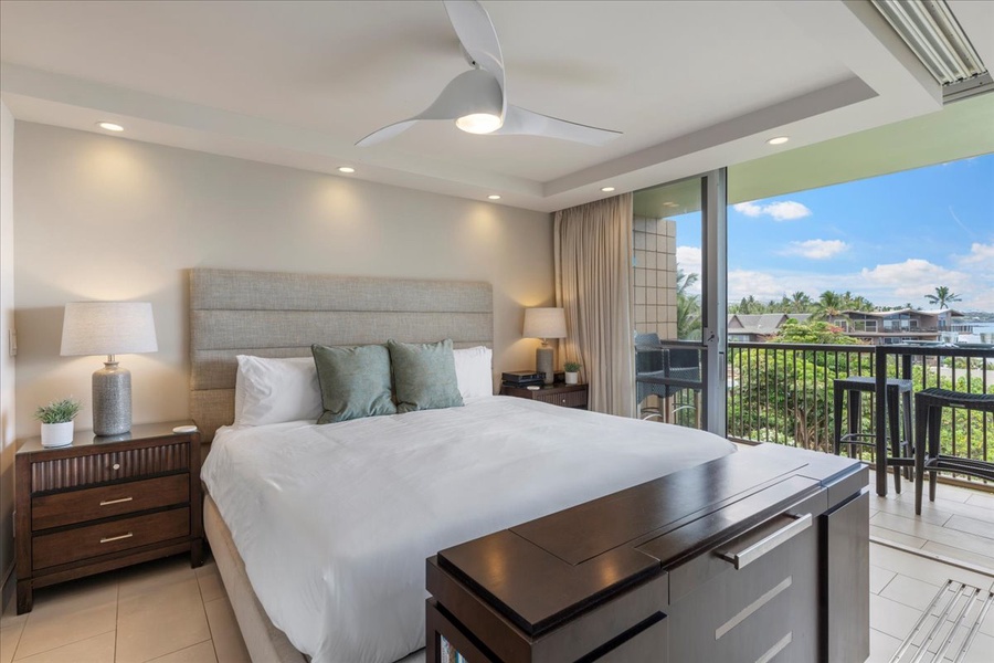 Primary bedroom features a king size bed