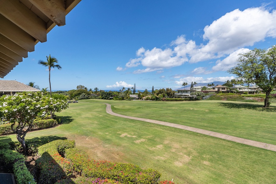 View of the fairway and ocean from the lanai. 