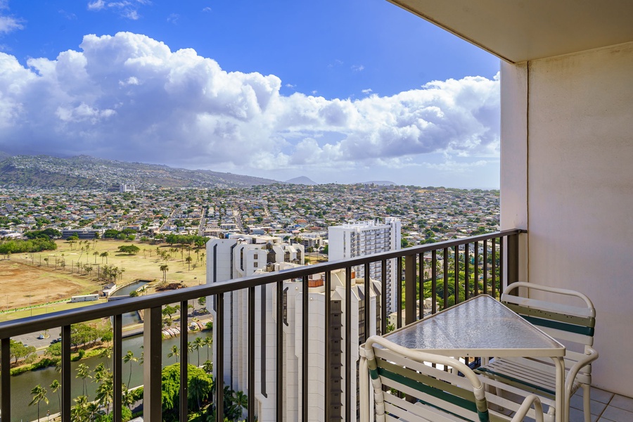 Private balcony with sweeping views of the city—ideal for sunset moments and starry nights.