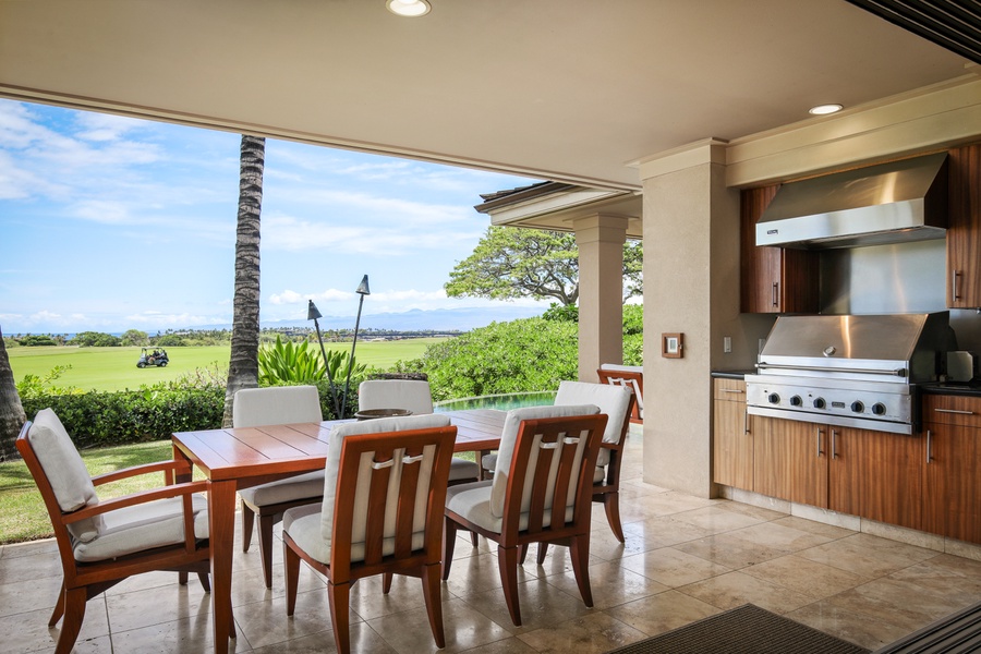 View of exterior dining featuring the top tier built-in BBQ grill.