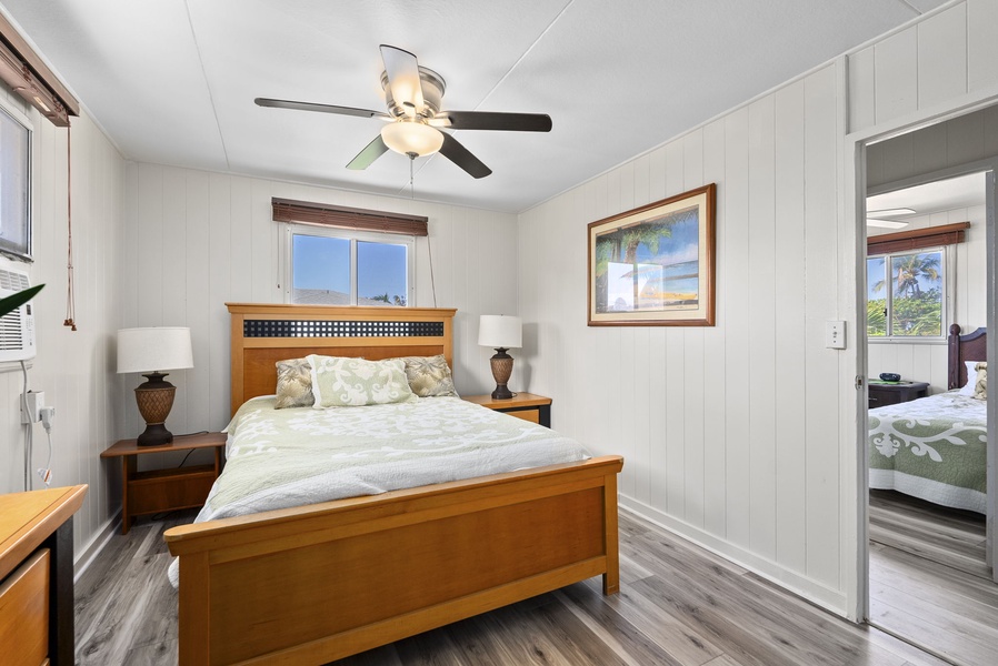 Inviting guest suite with queen bed and soft neutral tones.