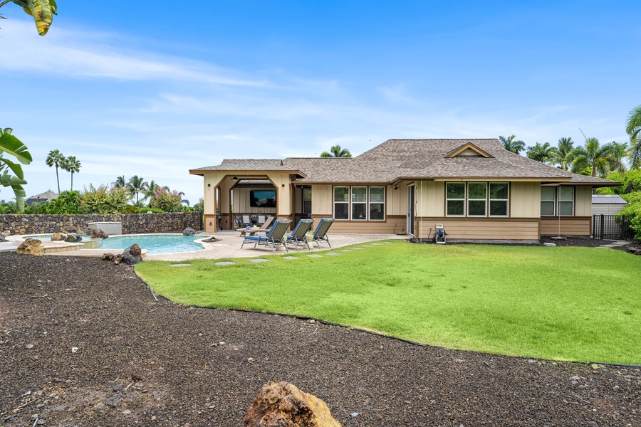 Spacious lawn perfect for outdoor fun or lounging under the sun.