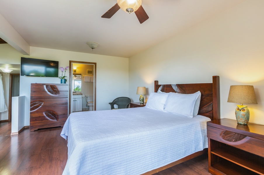 Guest Bedroom 6 has a queen bed and ceiling fan