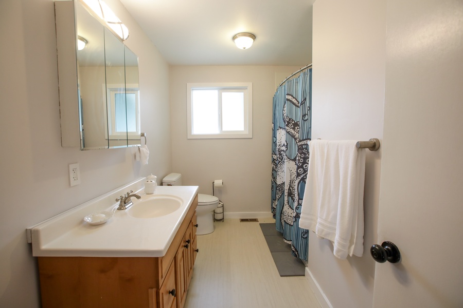Step into relaxation with our inviting bathroom ambiance captured in this photo