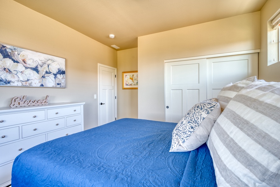 Ample storage options are available in the second bedroom, including a closet and dressers, ensuring you have plenty of space for your belongings