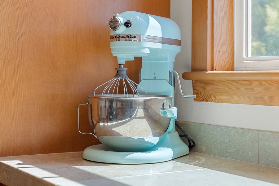 Equipped with a spacious countertop, and a professional-grade mixer, this thoughtfully designed station provides everything you need to explore your culinary creativity and indulge in the art of baking.