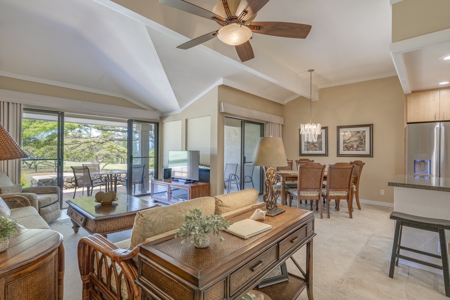 Indoor-outdoor living shines in this open-concept space with abundant light and tropical breezes.