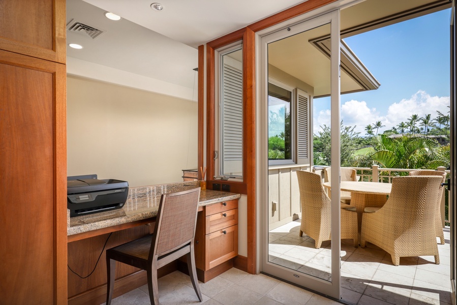 Built-in desk and a lovely breakfast balcony overlooking the immaculate courtyard.