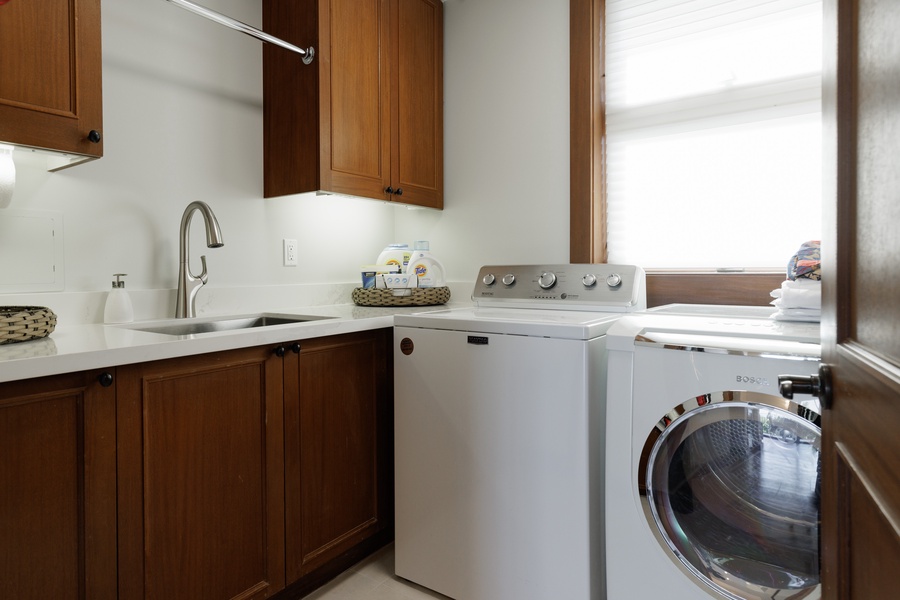 Convenient in-unit laundry area with a washer and dryer to make extended stays effortless.