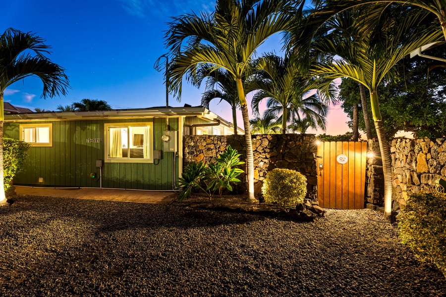 Evening glow highlighting the home’s tropical setting and privacy.