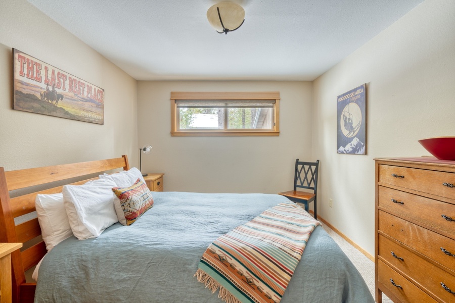 This guest bedroom has a dresser to keep your vacation essentials