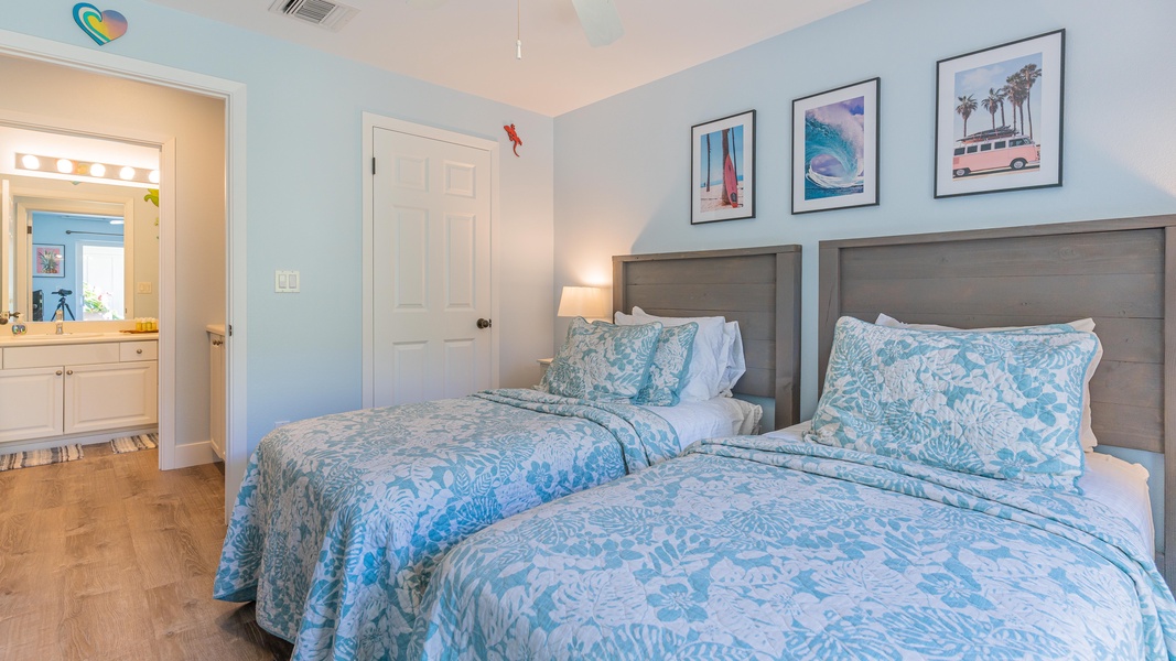 The second guest bedroom decorated in peaceful ocean blues.