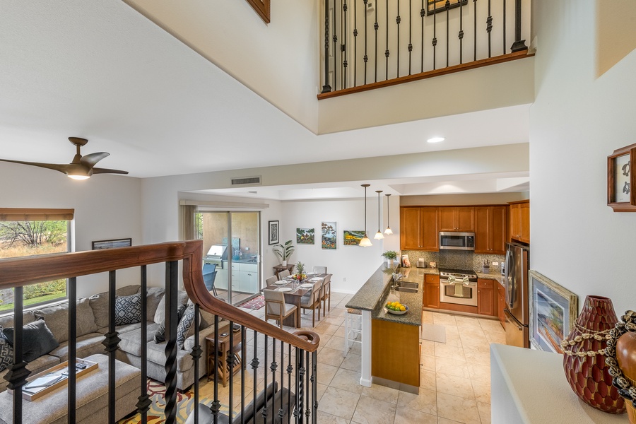 Lofted staircase adds elegance and natural light