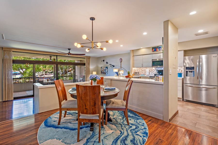 Cozy dining area with modern lighting, perfect for intimate meals.