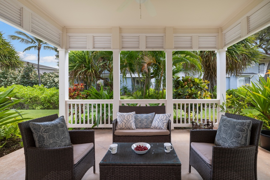 Unwind on the shaded lanai surrounded by lush Ko Olina greenery and tropical tranquility.