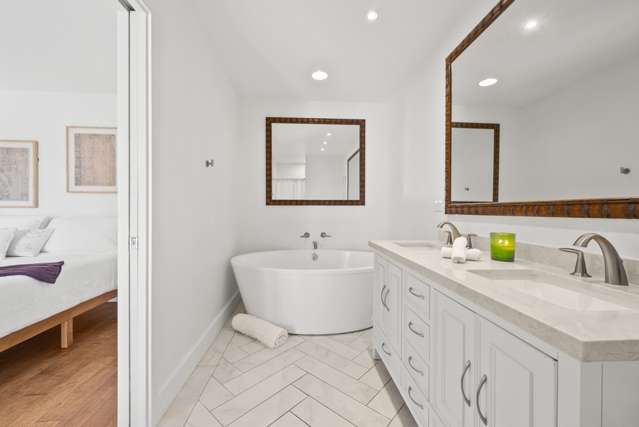 Spacious ensuite with a large soaking tub.
