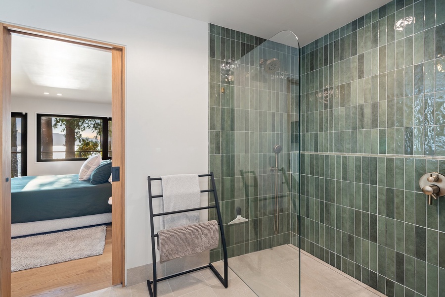 The ensuite bathroom has a separate walk-in shower.