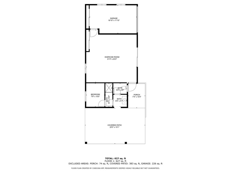 Private gym and garage space tucked away in the estate’s rear structure.