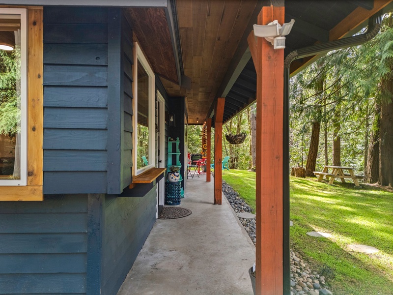Covered walkway offers easy access and forest views, even on misty mornings or rainy PNW days.