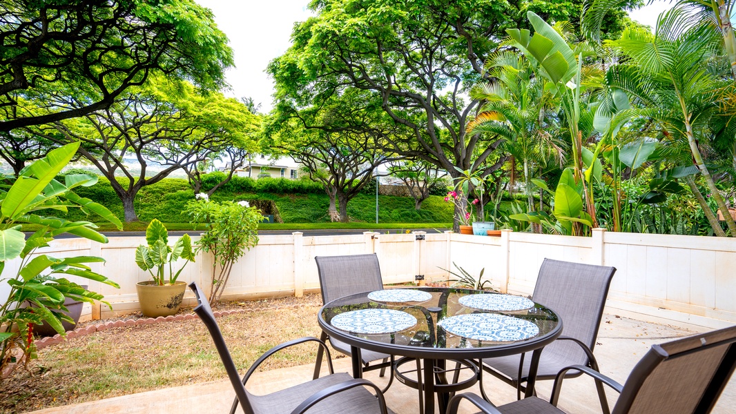 The tranquil backyard where you can dine al fresco on the lanai.
