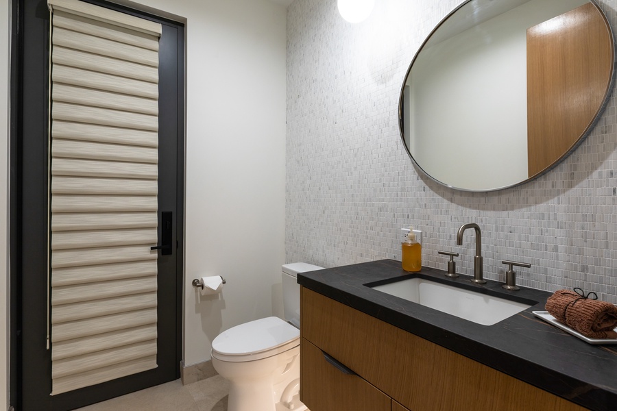 The powder room is on the main downstairs floor of the home.